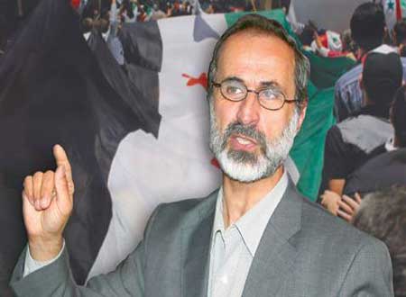 الخطيب يجدد دعوته للتحاور مع نظام الأسد 