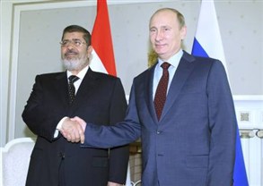 بوتين ومرسي مع وقف إطلاق النار في سوريا