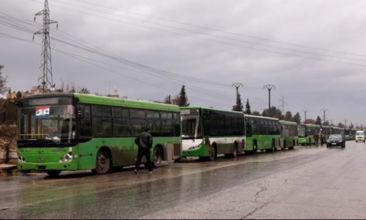 بدء إجلاء المسلحين بمرافقة جنود روس عن حلب الشرقية..,والصليب والهلال لنقل الجرحى