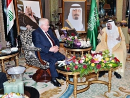 العاهل السعودي والرئيس العراقي يبحثان ملفات إقليمية