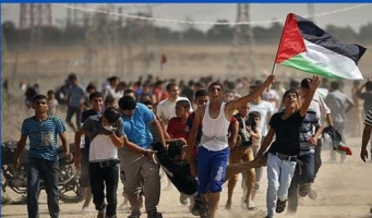 استشهاد شاب فلسطيني واصابة العشرات خلال مواجهات مع الاحتلال بغزة